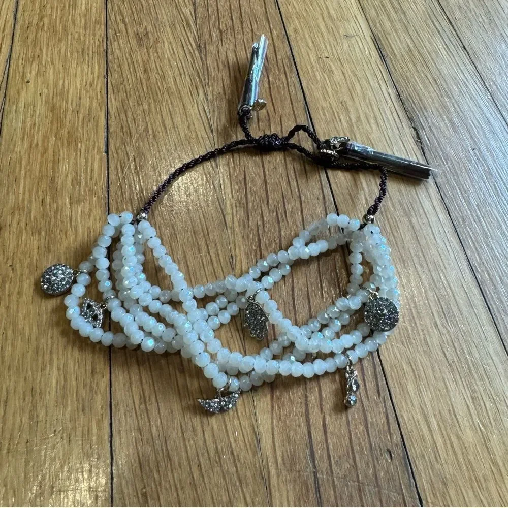 Revolve Marlyn Schiff White Beaded Tassel Trinket Pendant Bracelet